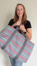 Load and play video in Gallery viewer, Blue and Red Stripe Duffle Bag
